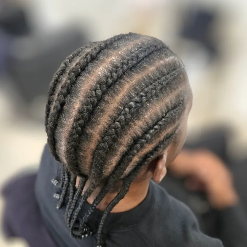 Eight straight-back cornrows by Yolande