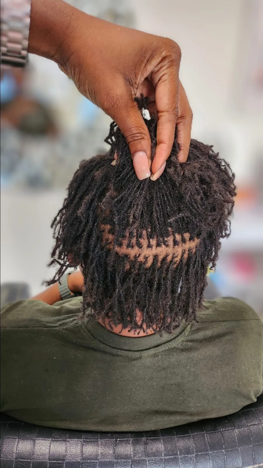 Microlocs wash and retie by Yolande
