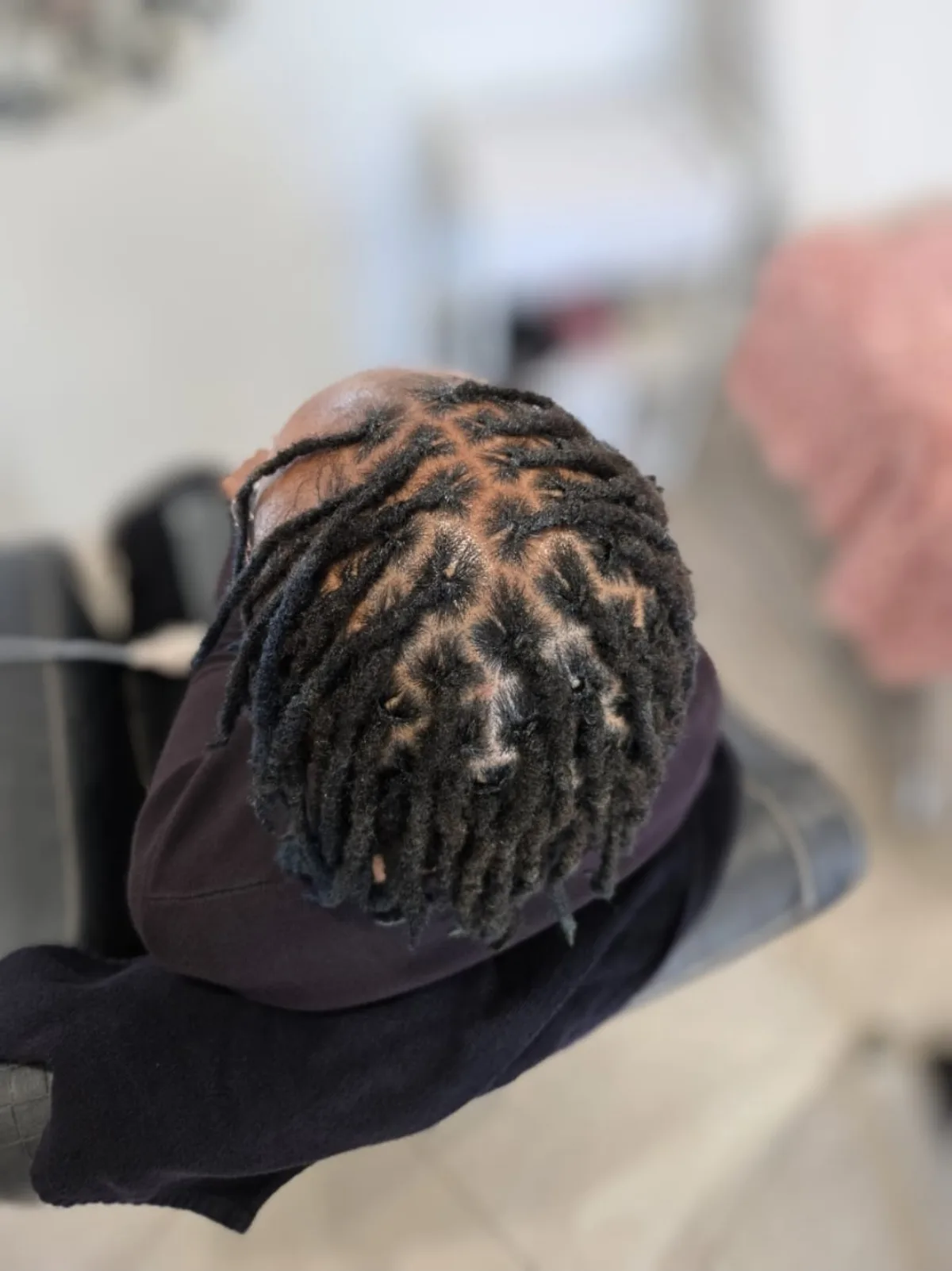Traditional locs retie by Yolande