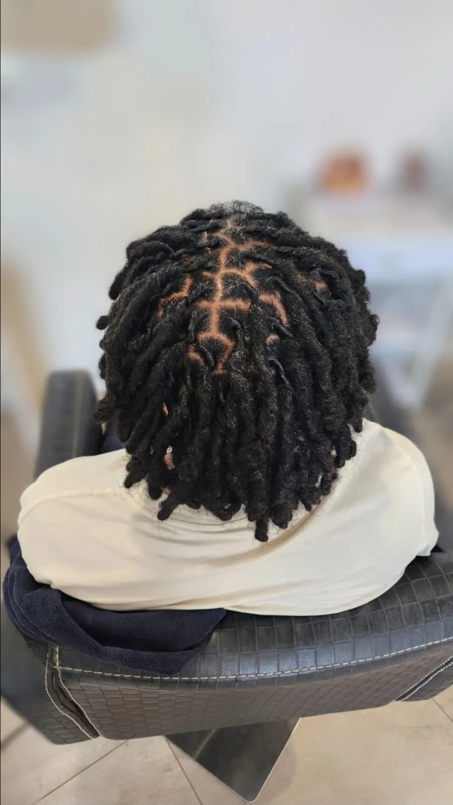 Traditional locs retie by Yolande